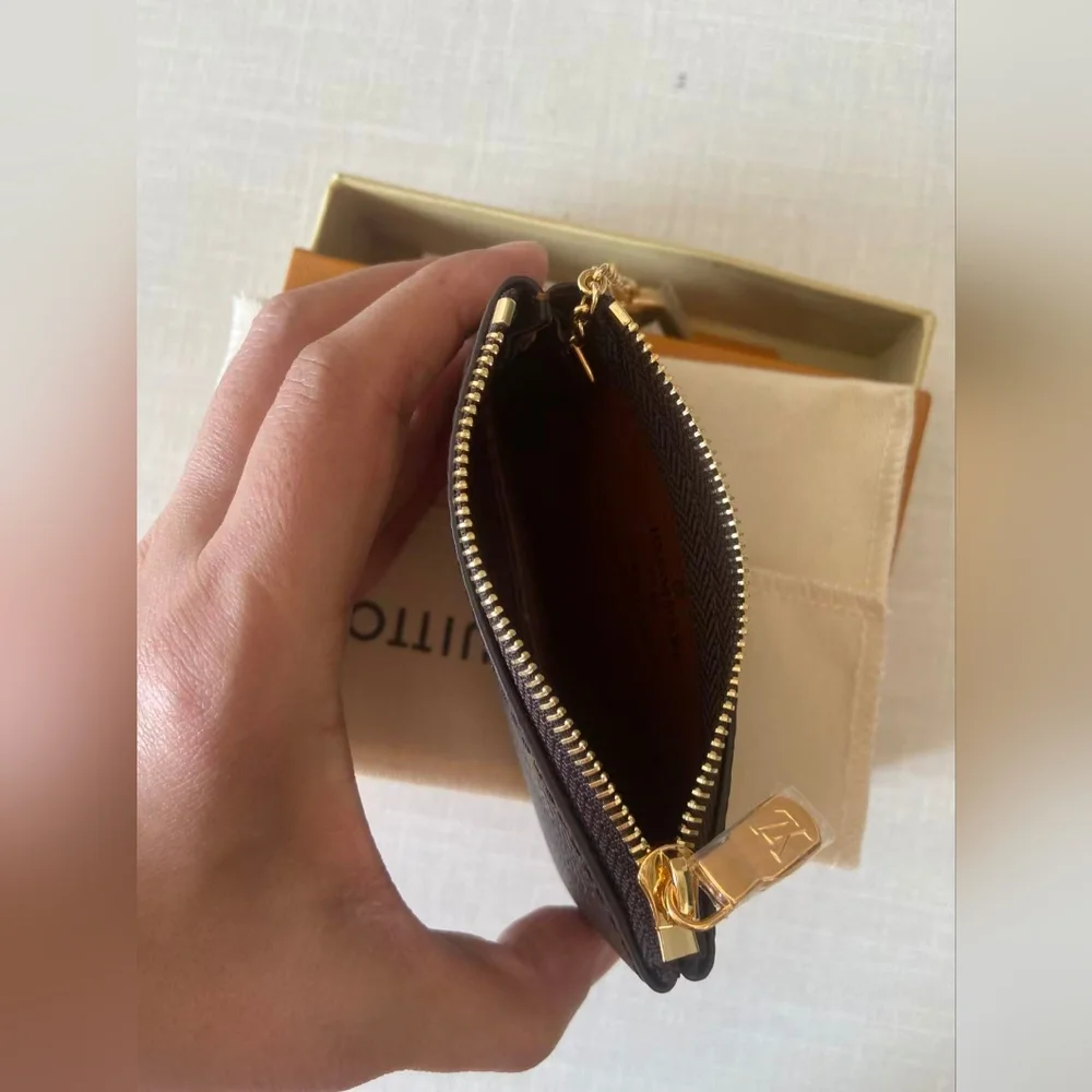 Louis Vuitton Monogram Zipped Key Pouch in Brown with Gold Hardware